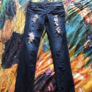 Distressed denim jeans